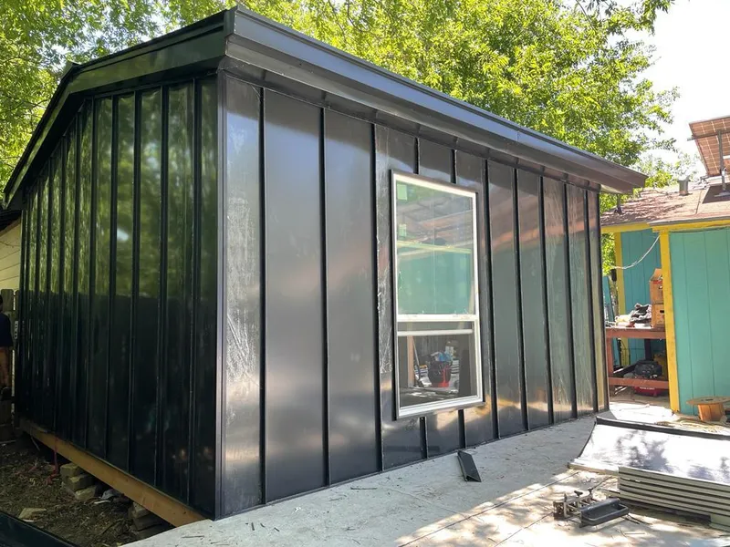 Black standing seam metal wall panels for Roof Inspection in Brownsville