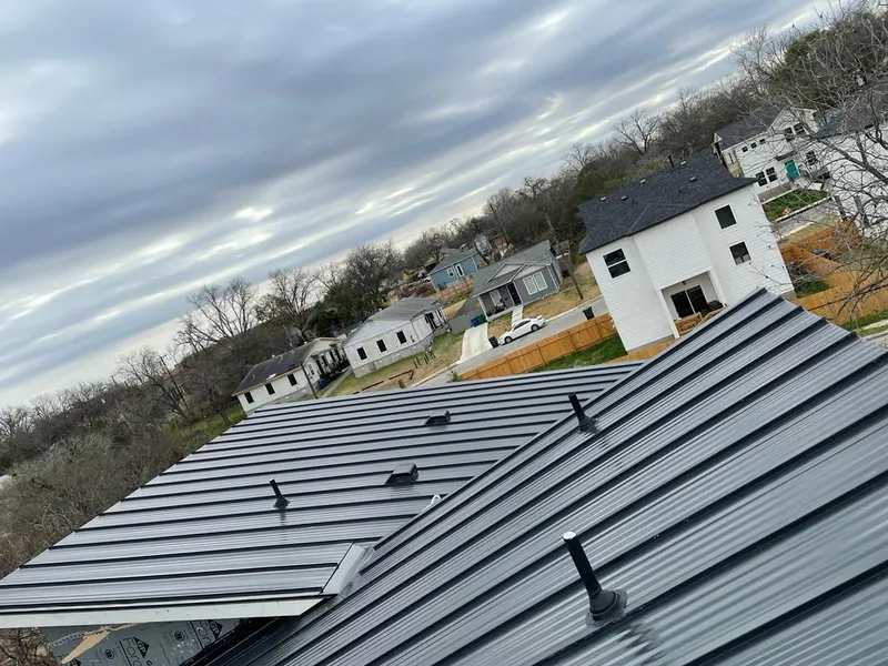 Standing seam metal roof panels with vents for Skylight Repair in Brownsville